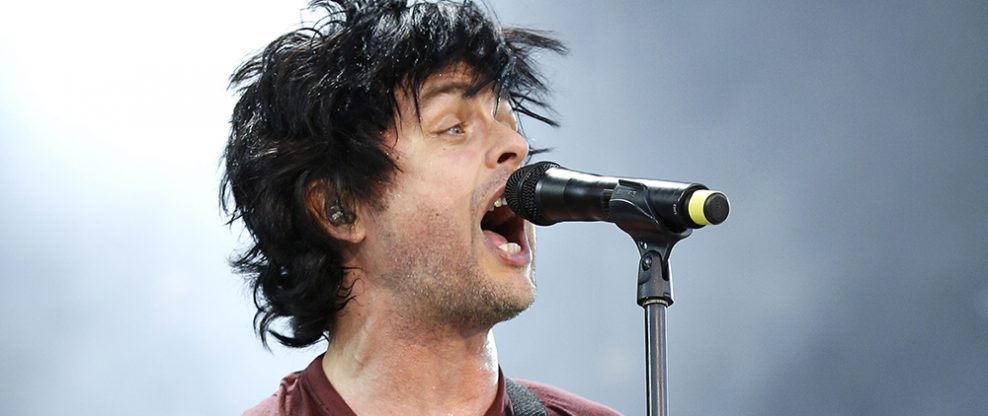 Billie Joe Armstrong Tosses His Guitar In A Pool At Cannes Show