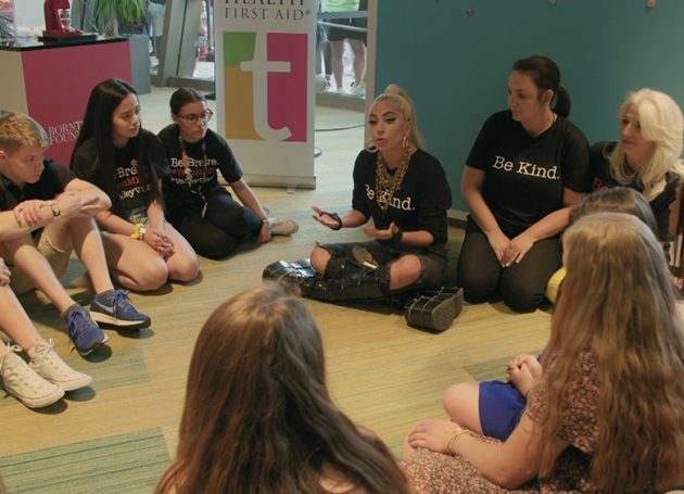 Lady Gaga rapping with some teens