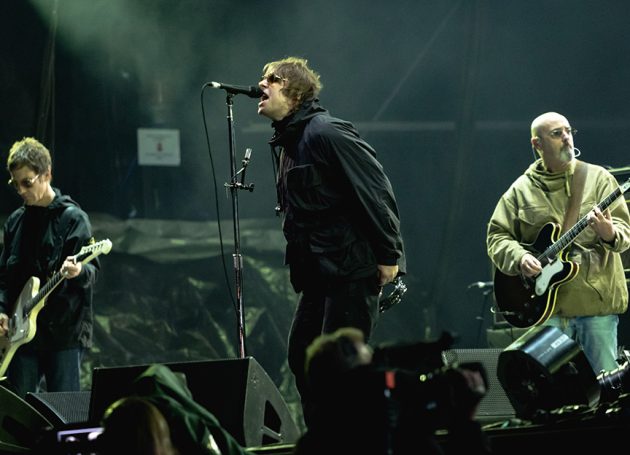 Oasis Guitarist Paul "Bonehead" Arthurs Drops Out Of Knebworth Reunion To Undergo Cancer Treatments