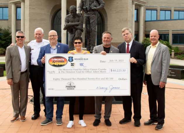 Nancy Jones Presents Fundraising Check To Huntsville Police Department